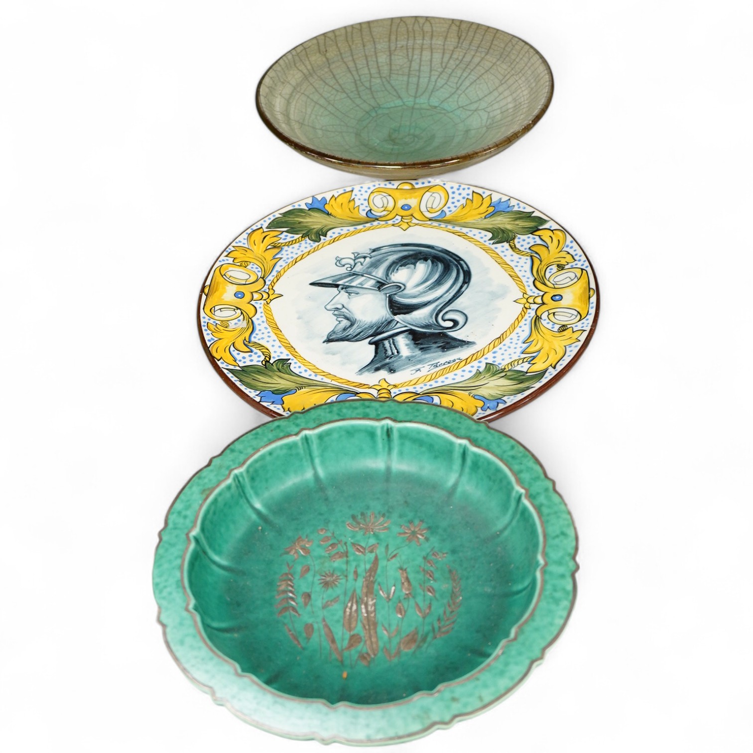 A Gustavsberg Argenta ware footed dish, a signed maiolica charger and a studio pottery crackle glazed bowl, largest 35cm